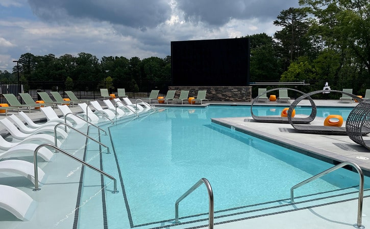 resort style pool with jumbrotron media screen 13 signature hartwell village apartments near clemson university south carolina sc