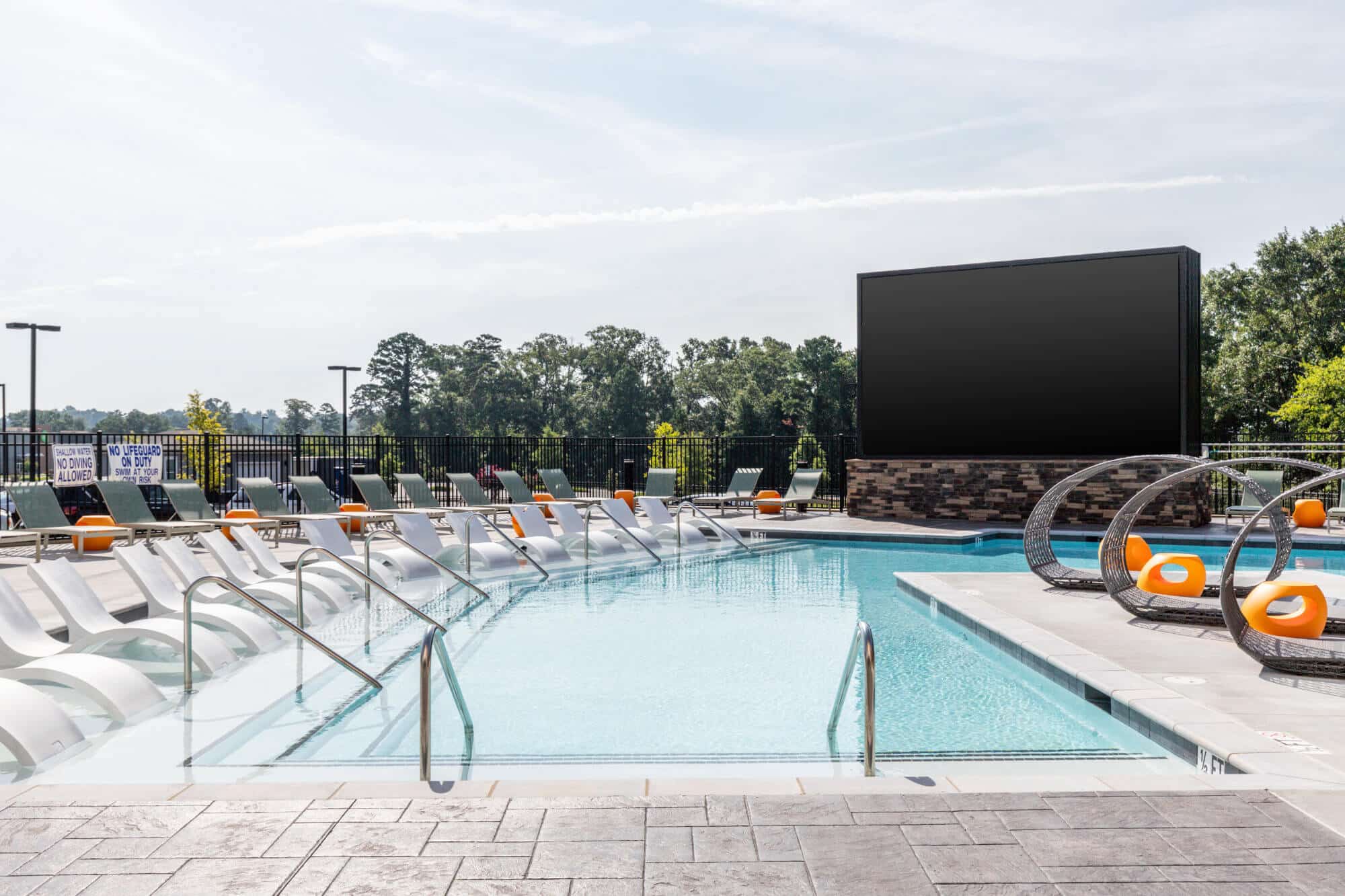 signature hartwell village off campus apartments near clemson university resort style pool with 24 foot outdoor jumbotron screen
